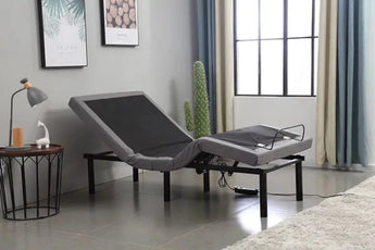 My Furniture adjustable electric bed base with gray upholstered frame and black metal legs, ideal for customizable comfort and support.