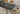 EXT. DINING TABLE - BLACK